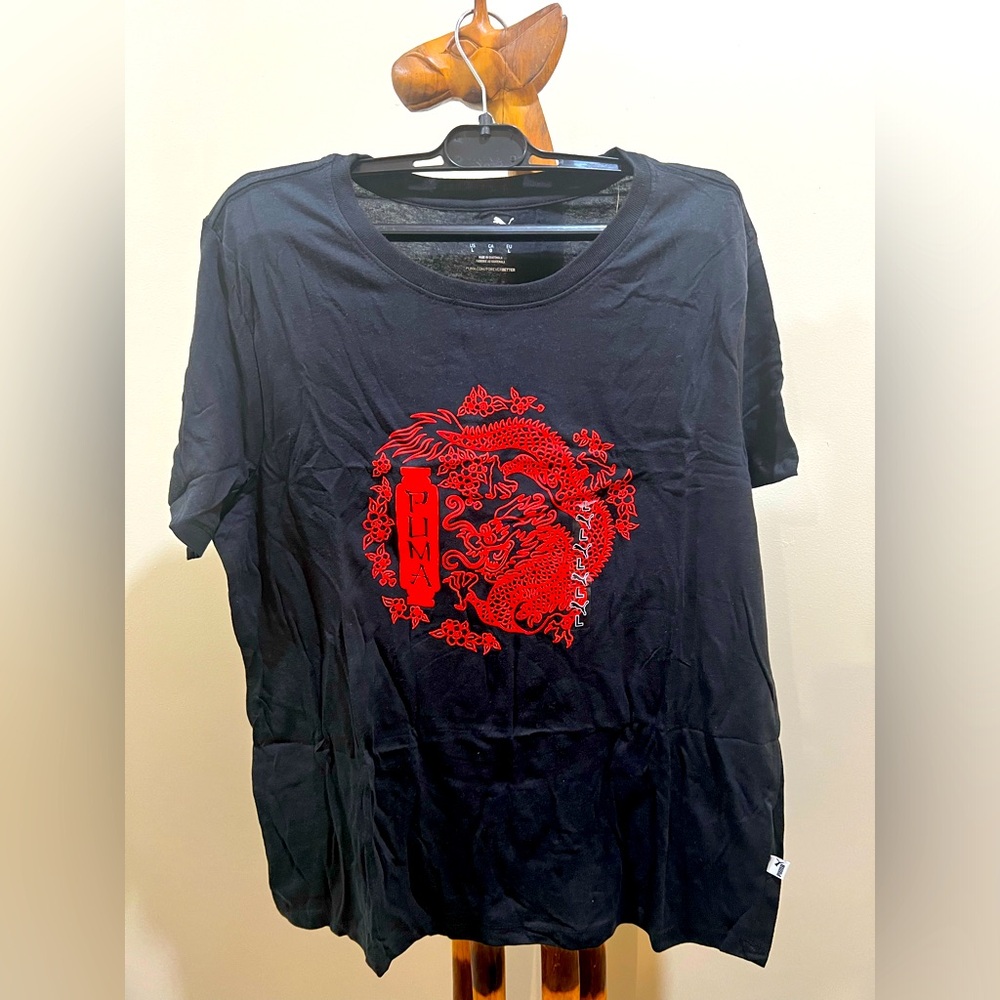 Black puma t-shirt with red design.